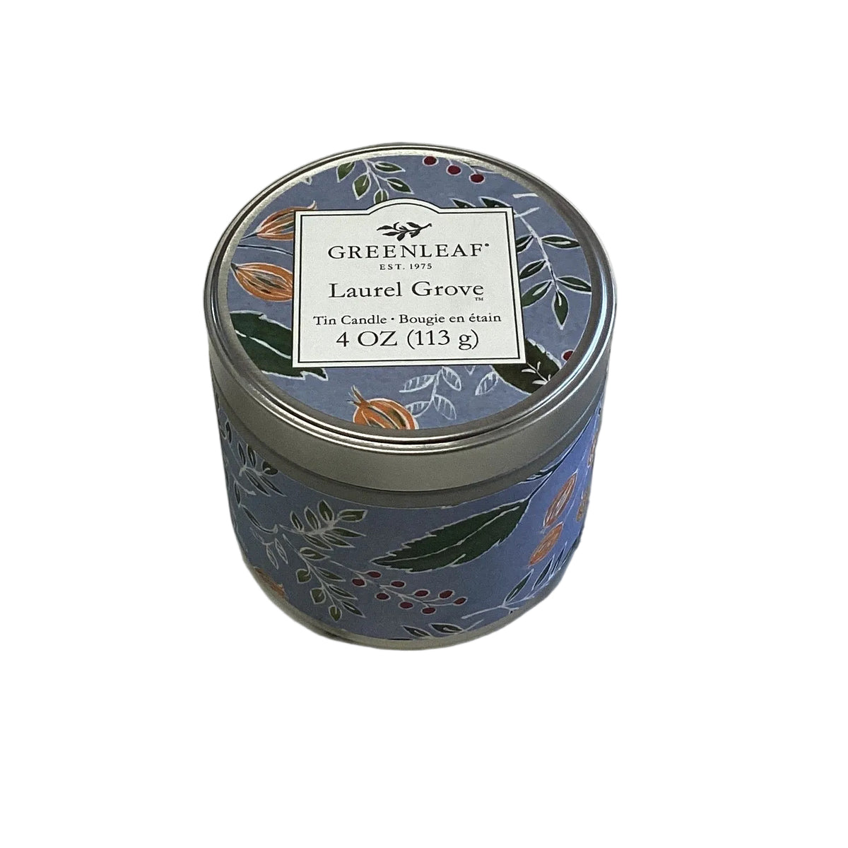 4oz “Laurel Grove” tin candle with floral design, featuring a refreshing fir balsam scent.