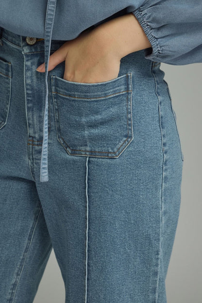 Straight Leg Denim with subtle seam details, available in sizes 26–34.