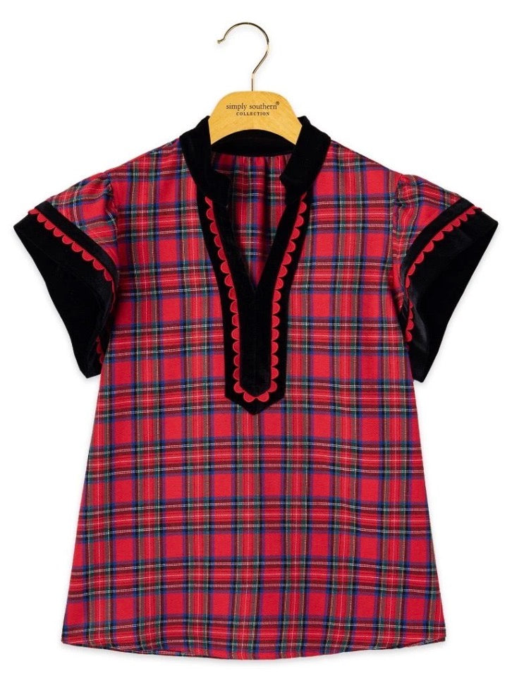 Red plaid blouse with black velvet trim, scalloped neckline and sleeves. Available in sizes XS–XL.