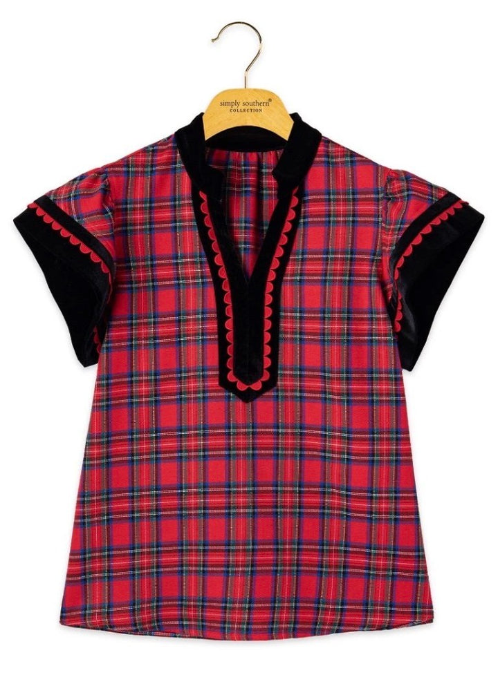 Red plaid blouse with black velvet trim, scalloped neckline and sleeves. Available in sizes XS–XL.