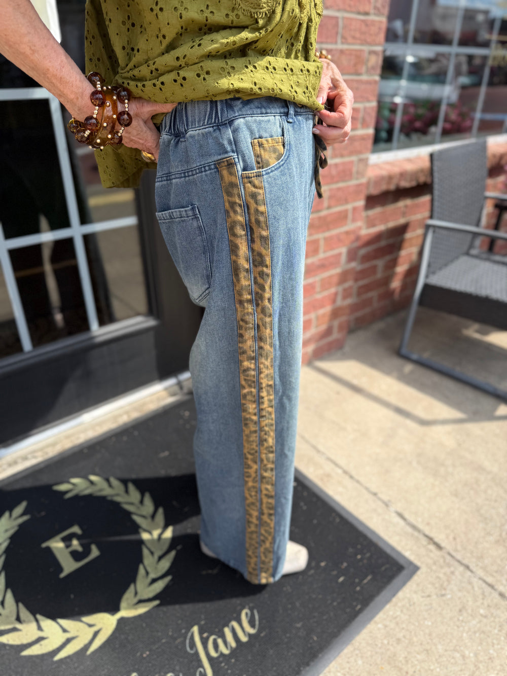 Cheetah Contrast Jeans: relaxed fit blue jeans with animal-print side stripe. Available in sizes XS–XL.