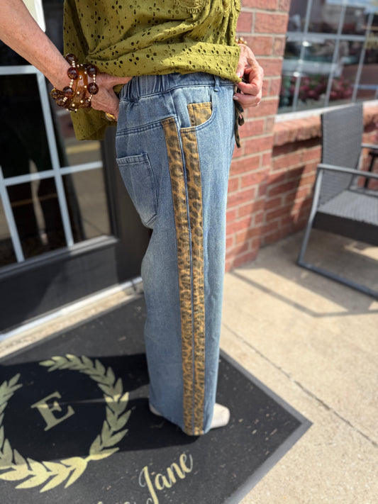 Cheetah Contrast Jeans: relaxed fit blue jeans with animal-print side stripe. Available in sizes XS–XL.
