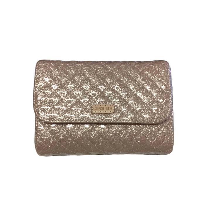 On The Town, Ori quilted light pink glitter mini messenger bag with fold-over flap, magnetic closure, and logo patch. One size.