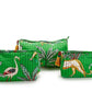 Three Hand Block Printed Pouches, rectangular and quilted, green with tropical foliage and animal prints of a heron and leopard. Adorned with yellow tassels on zippers. Water-resistant for durability. Sizes available: Small, Medium, Large.
