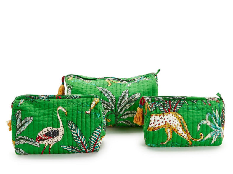 Three Hand Block Printed Pouches, rectangular and quilted, green with tropical foliage and animal prints of a heron and leopard. Adorned with yellow tassels on zippers. Water-resistant for durability. Sizes available: Small, Medium, Large.