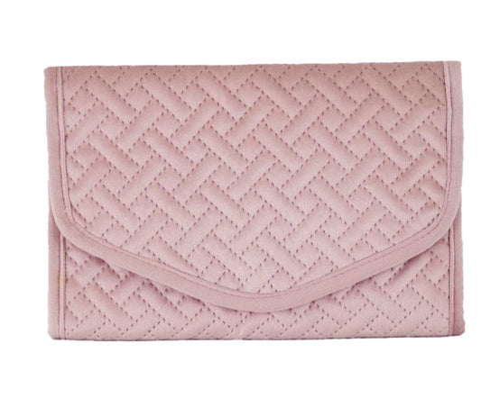 Pink quilted clutch purse with flap closure and chevron pattern design. Perfect for travel. Rectangular shape. Sizes available: One size only.