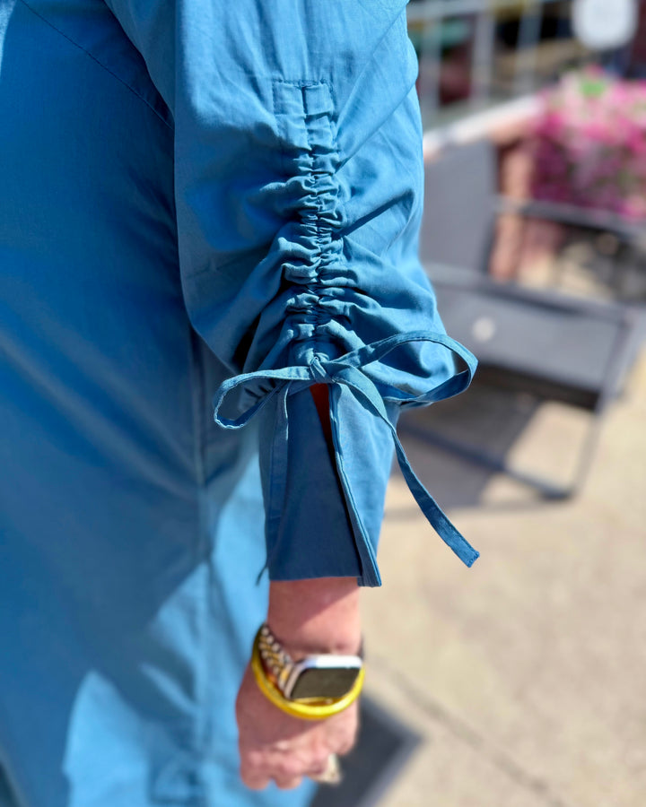 Teal Collared Button Detail Relaxed Midi Dress with relaxed fit and ruched, tied sleeves. Available in sizes XS–XL.