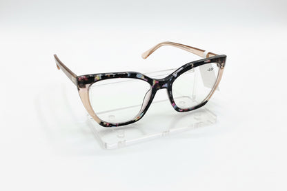 Cat-eye reading glasses with multicolored frames in pink, black, blue, and yellow. Available in multiple sizes.