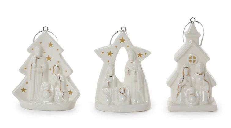 Starry Manger Light-Up Keepsake Ornament set featuring three white ceramic tree, star, and church ornaments with holy scenes and gold star accents.
