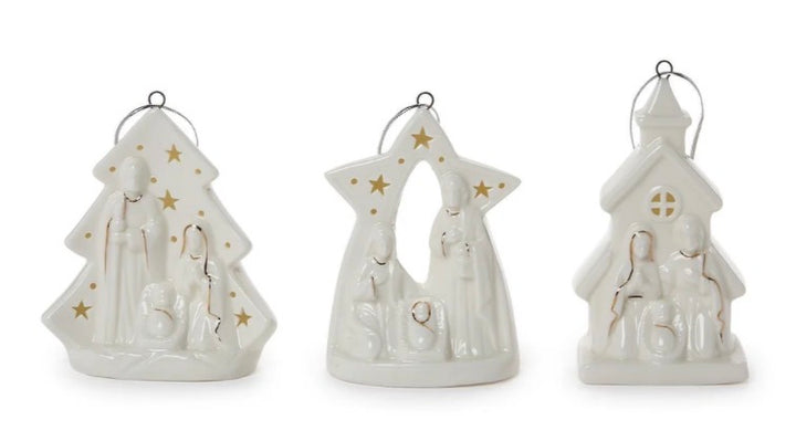 Starry Manger Light-Up Keepsake Ornament set featuring three white ceramic tree, star, and church ornaments with holy scenes and gold star accents.
