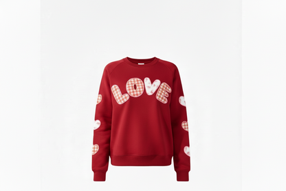 Red sweatshirt with plaid "LOVE" applique on chest, plaid heart patches. Available in sizes S-XL.