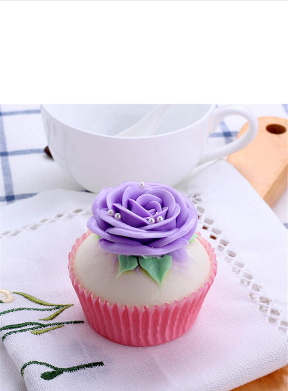 Faux cupcake with pink wrapper, purple rose frosting, silver beads. Available in small and medium sizes.