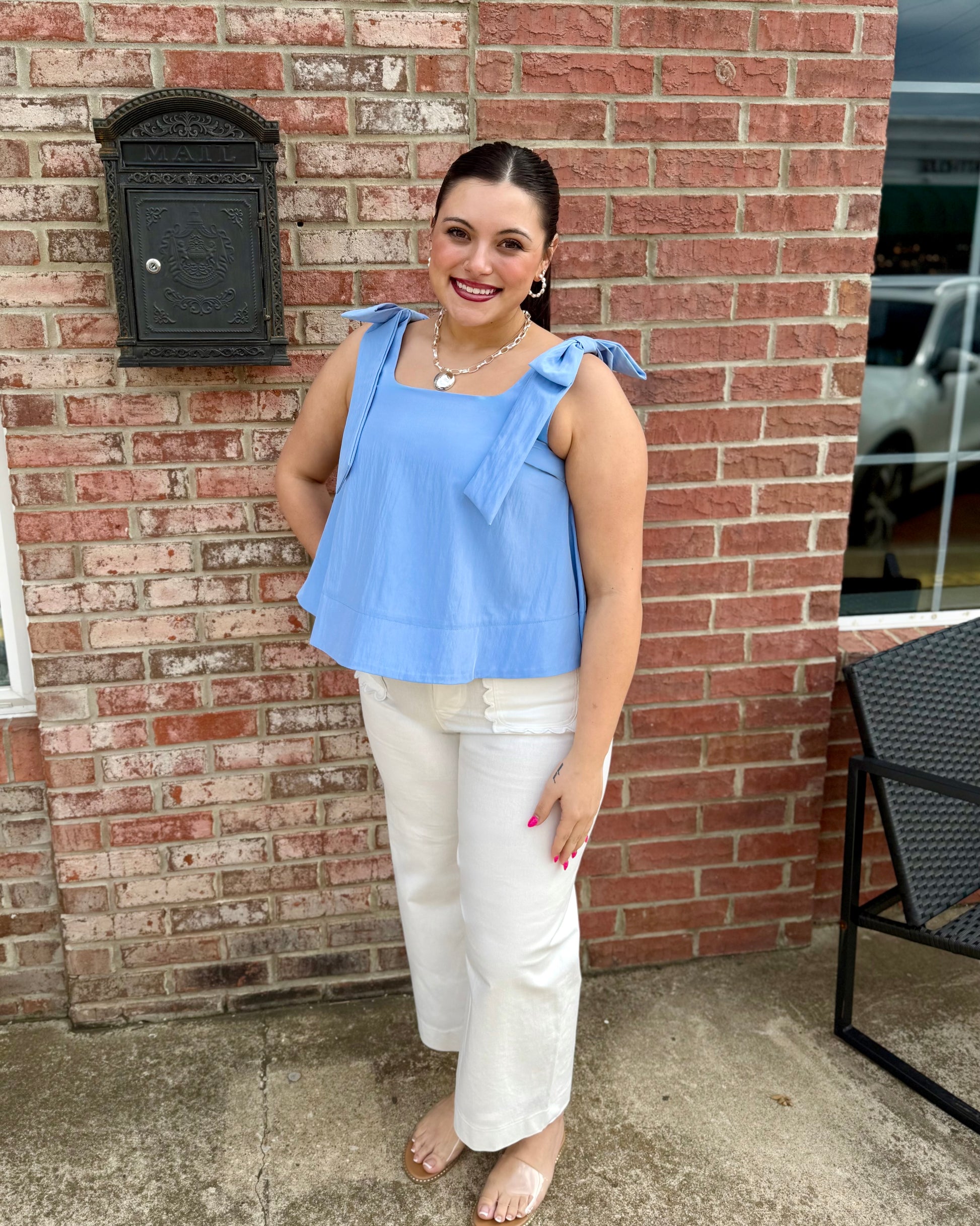 Sky Scoop Neck Bow Shoulder Top; available in sizes XS-XL. Features scoop neck and bow straps.