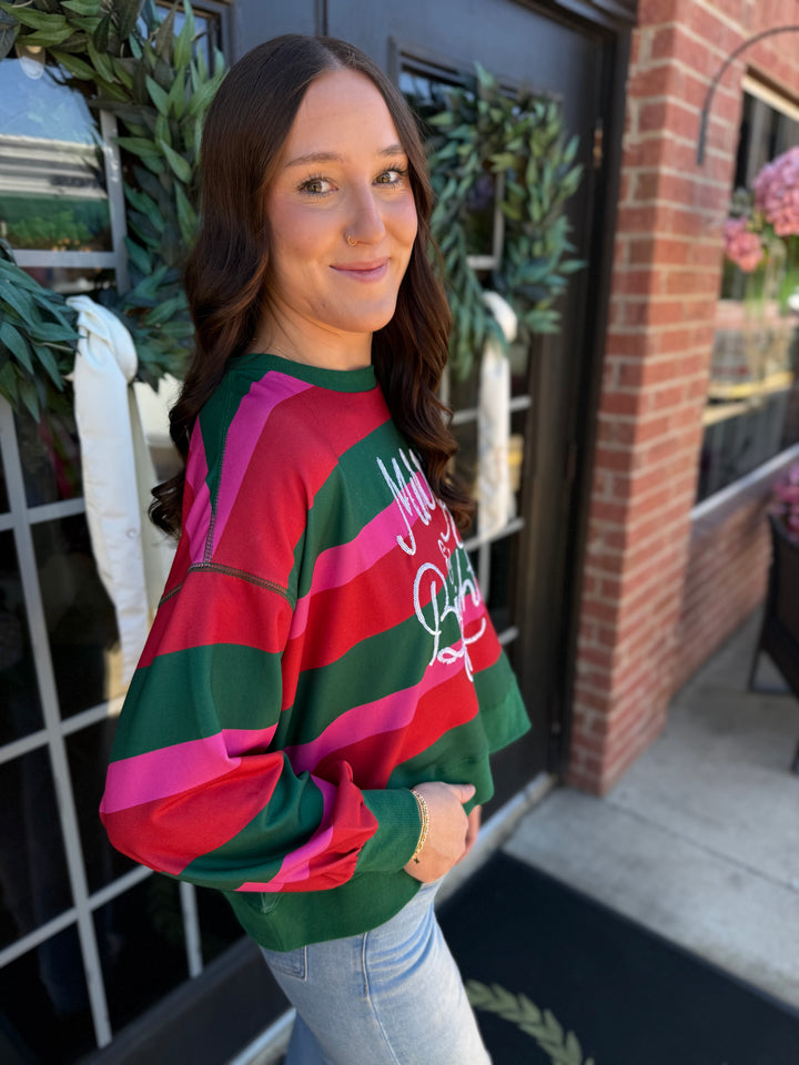 Millie Merry &amp; Bright striped crewneck sweatshirt with white cursive lettering. Available in all sizes.