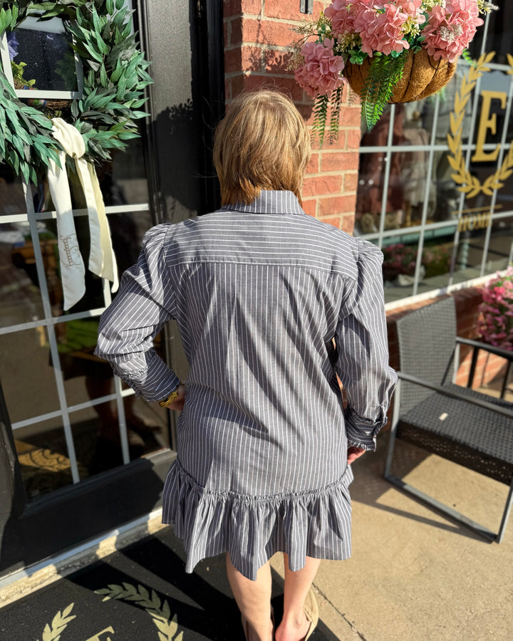 Long-sleeved Drop Waist Shift Dress with ruffled stripes. Available in sizes XS-XL.