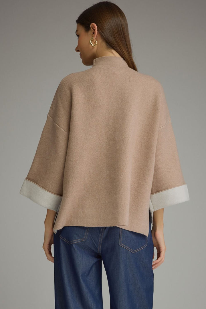Contrast Mock Neck Sweater in tan with mock neck, three-quarter sleeves, and white cuffs. Available in all sizes.