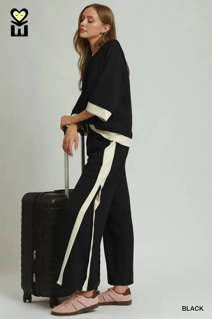 Black Colorblock Side Striped Straight Pants with white side stripes, straight-leg cut. Available in sizes XS-XL.