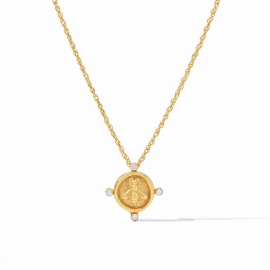 Round gold pendant with bee motif, four cubic zirconia stones, adjustable chain. Available in 16", 18", and 20" lengths.