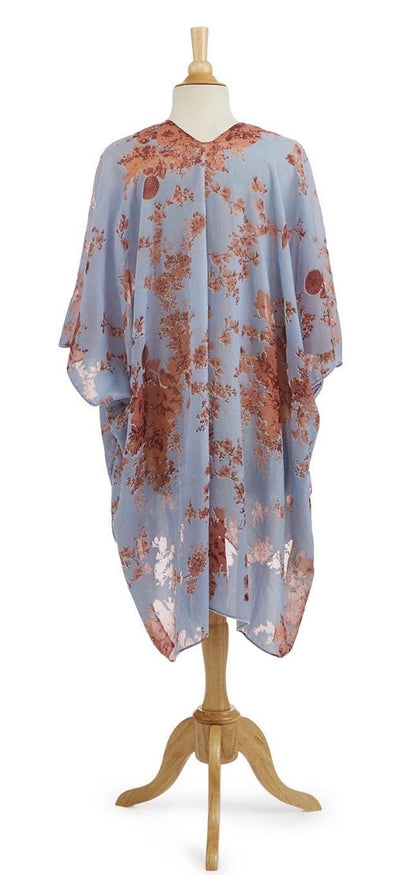 Periwinkle blue velvet kimono with light blue floral design and copper-colored patterns. Available in sizes S, M, L, XL.