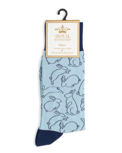 Light blue men’s socks with dark blue heel, toe, and cuff, bunny outline pattern. Sizes: M, L. Packaged as The Royal Standard.