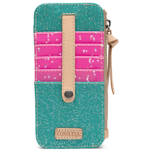 Card Organizer Shay: compact wallet with teal and pink sections, tan accents, snap closure, strap, “Consuela” patch at bottom, and white star patterns on pink area. Available in one size.