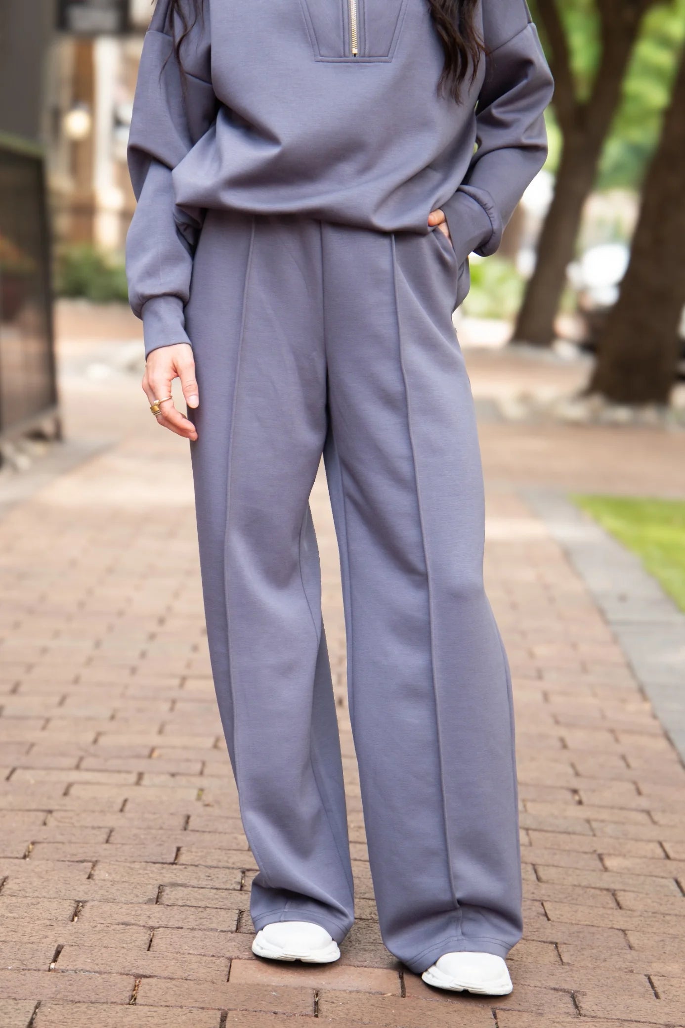 Lavender tracksuit, loose-fitting; available in sizes XS–XXL.