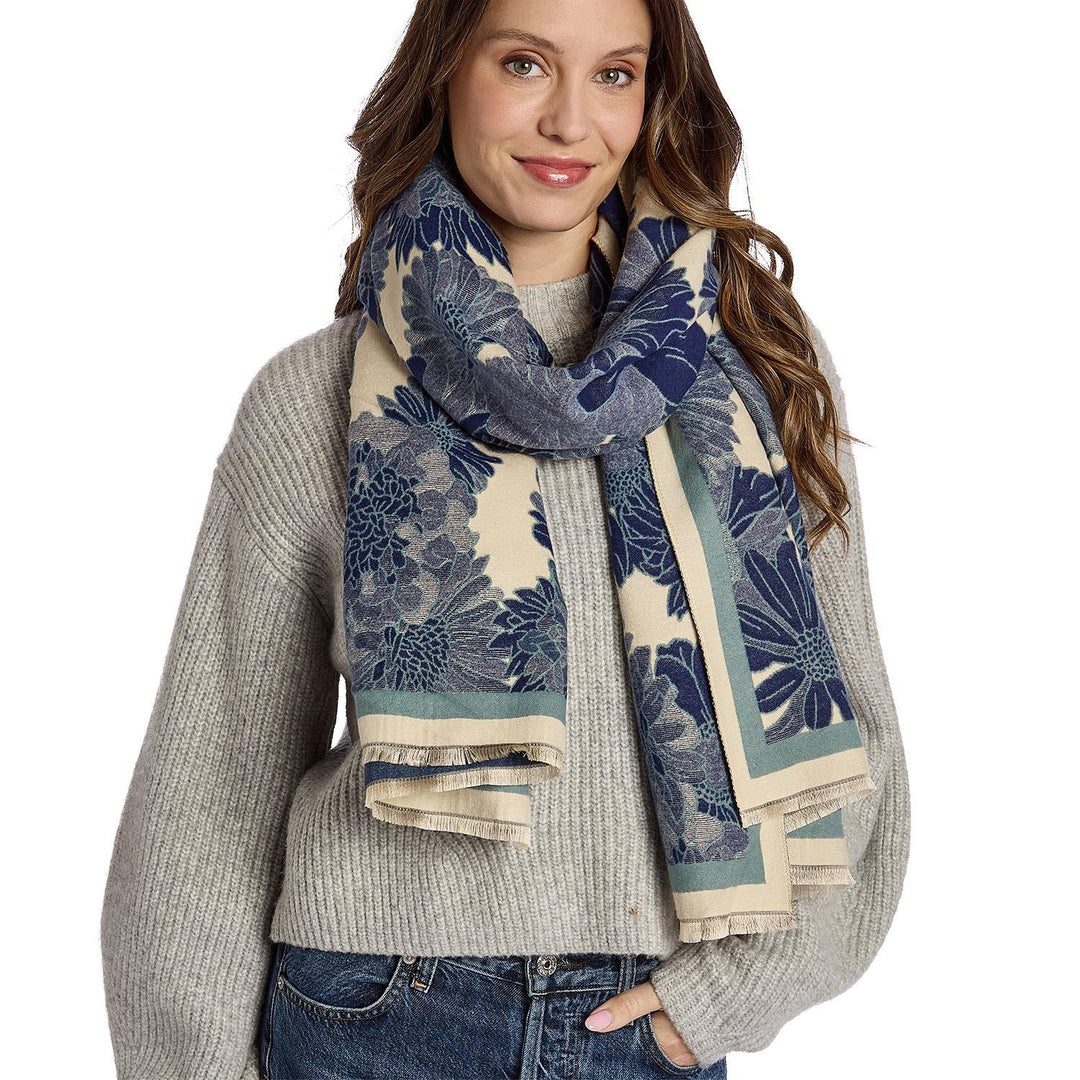 Blue floral scarf in cream lightweight fabric with fringed ends.