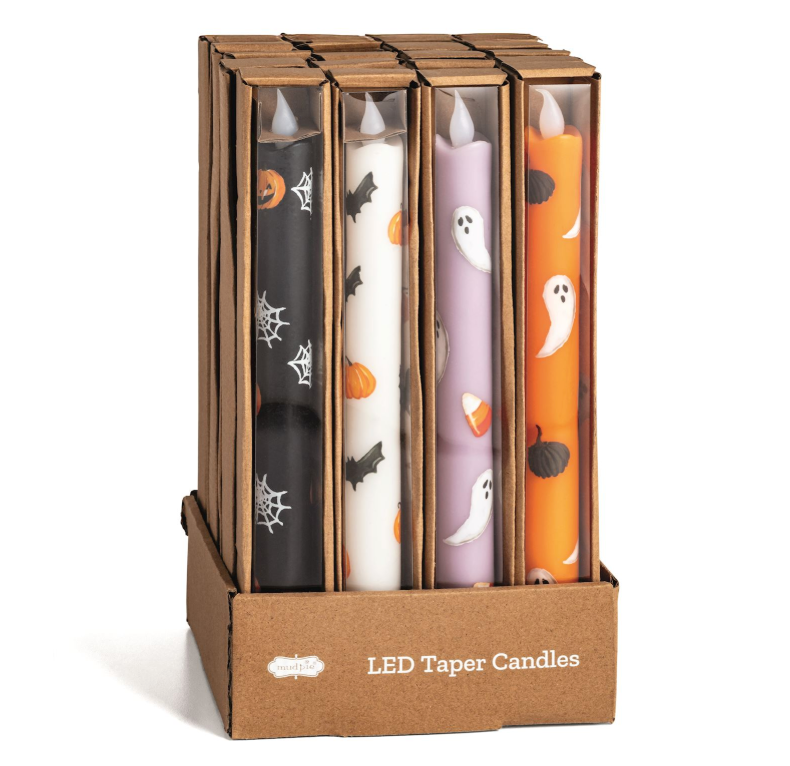 Set of four Halloween LED taper candles, assorted designs. Battery-operated. Available sizes: 8", 10", and 12".