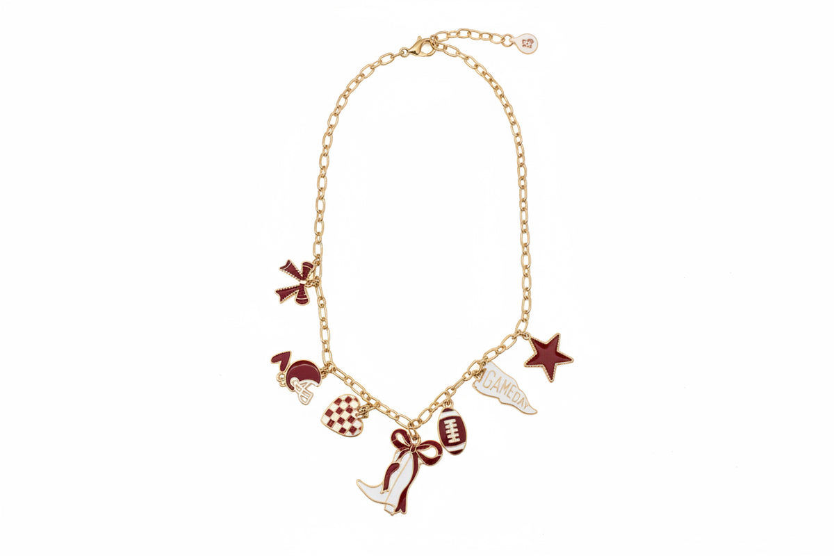 Gold Game Day Necklace featuring football, megaphone, pom-pom, star, boot charms, and an “OKLAHOMA” pendant. Available in multiple sizes.