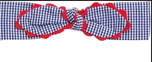 Blue and white checkered bow headband with red scalloped edging; available in sizes 0-3M, 3-6M, 6-9M, and 9-12M.