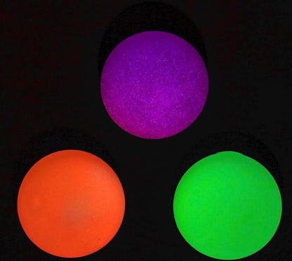 Glow In The Dark Blob Squishy available in purple, orange, and green; multiple sizes offered.