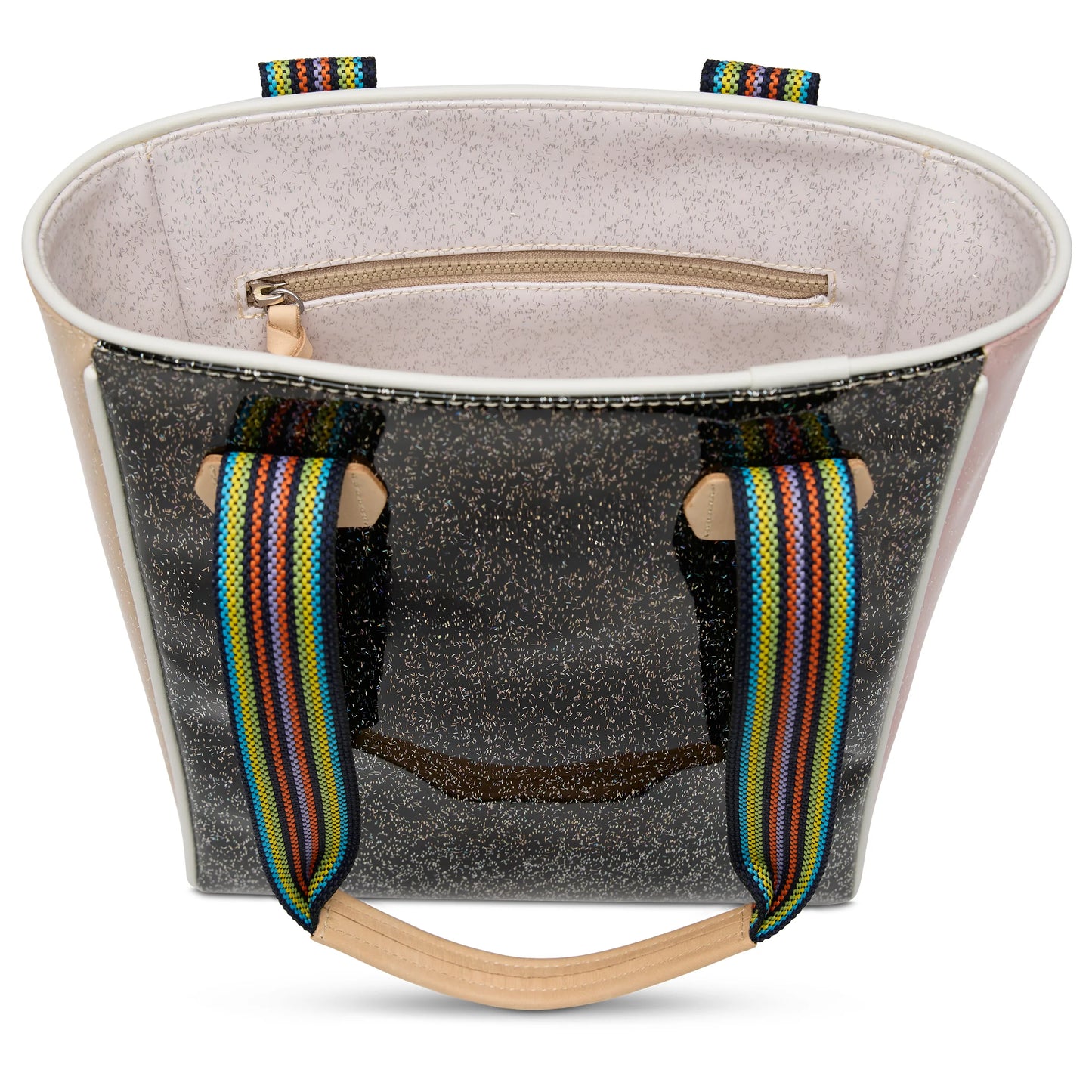 Open handbag with glittery exterior, light interior, zipper pocket, and rainbow-striped handles. Chica Tote, Bae available in multiple sizes.