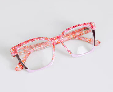 The Birdie | Peepers x Laura Park glasses with a pink and red floral frame. Available sizes: narrow, regular, wide.