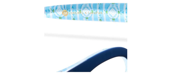 Close-up of blue and white floral Center Stage Peepers x Laura Park frame arm with gold text. Sizes: +1.00 to +3.00.