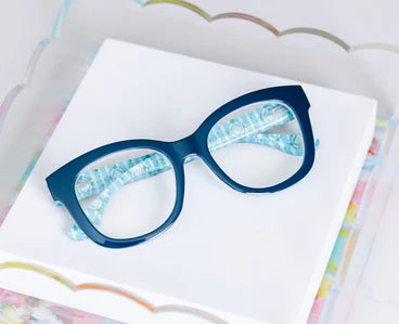 Center Stage | Peepers x Laura Park blue cat-eye glasses with patterned inner arms and blue light lenses. Sizes: narrow, regular, wide.