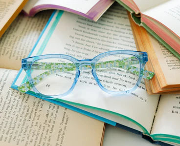 The Nola Peepers x Laura Park blue cat eye readers with floral-patterned arms. Available in multiple sizes.
