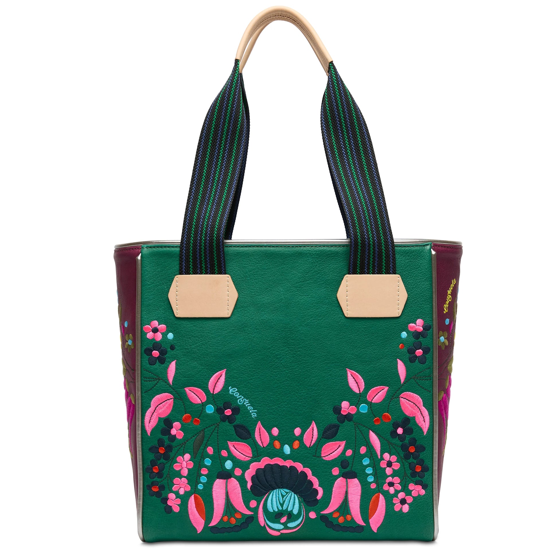Green Consuela Classic Tote, Riley: striped handles, pink/purple/green floral embroidery, tan accents. Sizes: small, large.