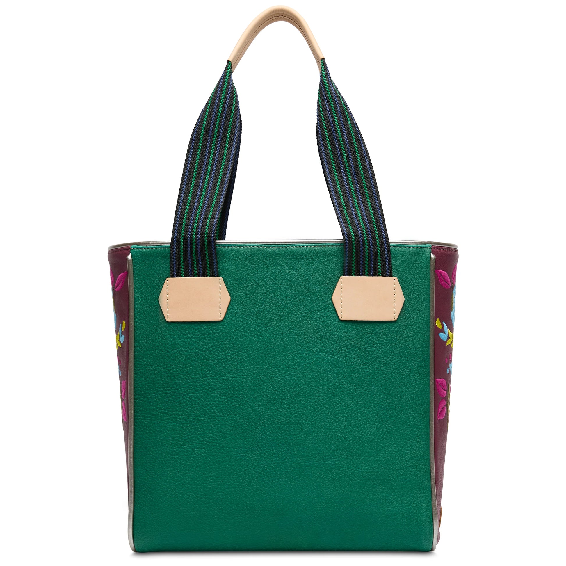 Green leather tote with striped straps, tan leather handles, floral embroidery. Available in multiple sizes by Consuela.