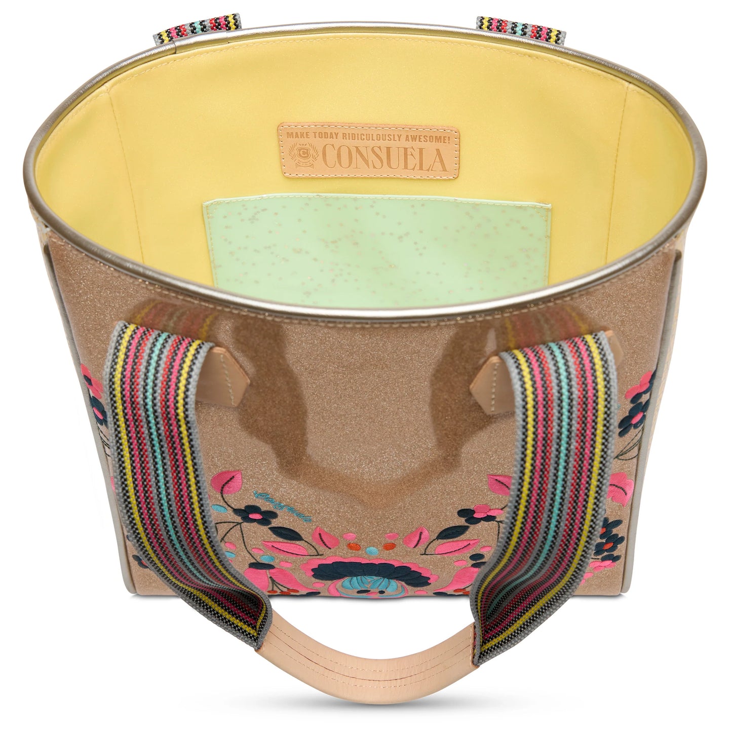 Classic Tote Lyla: gold with floral embroidery, striped handles, yellow lining, mint pocket. Label text inside. Sizes: S/M/L.