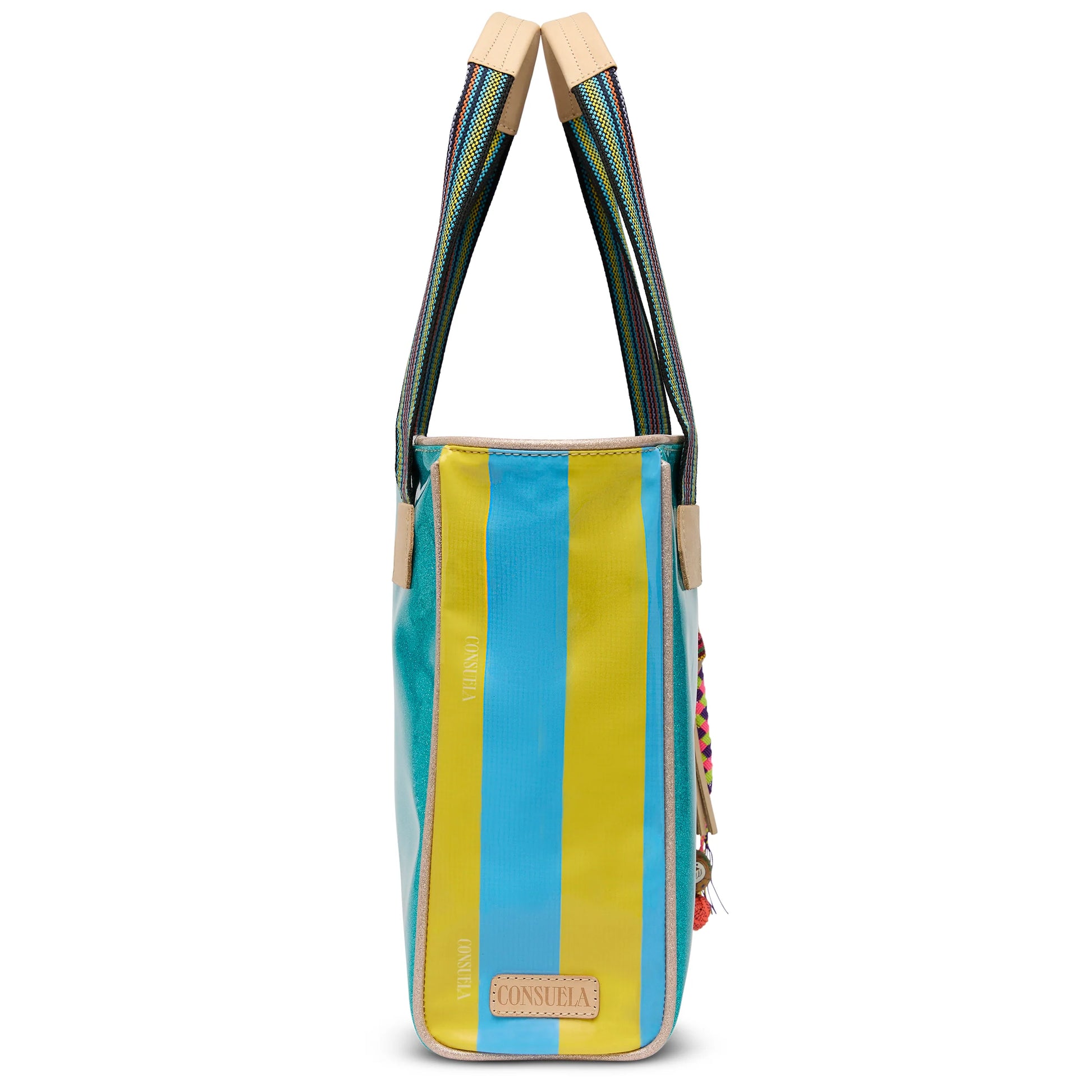 Consuela Classic Tote Lumi: blue, yellow, turquoise stripes, multicolored handles, tan leather patch. Available in multiple sizes.