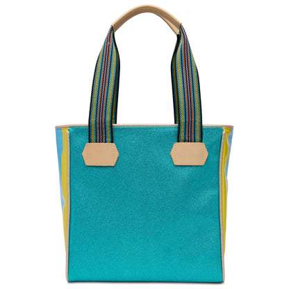 Classic Tote Lumi: shimmery turquoise, beige handles, striped straps, yellow/blue accents. Available sizes: small, medium, large.