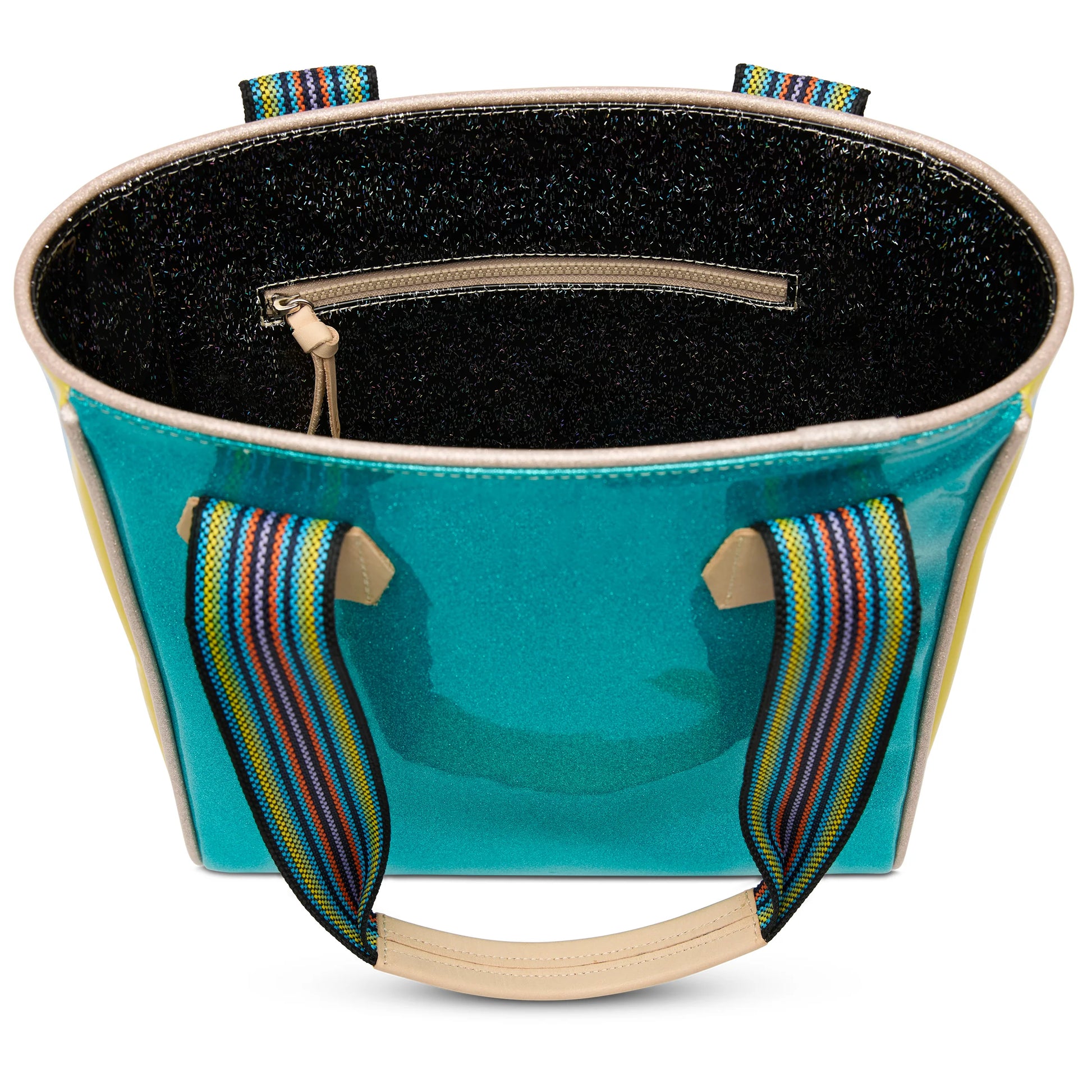 Turquoise Consuela Classic Tote with rainbow-striped handles, black glittery interior, zip pocket. Available in standard size.