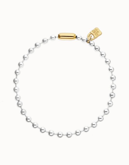 Bead Necklace with Contrasting Accents from the Pálpito Collection, featuring silver beads, a gold clasp, and a gold tag with an intricate engraving. Available in 16", 18", and 20" lengths.