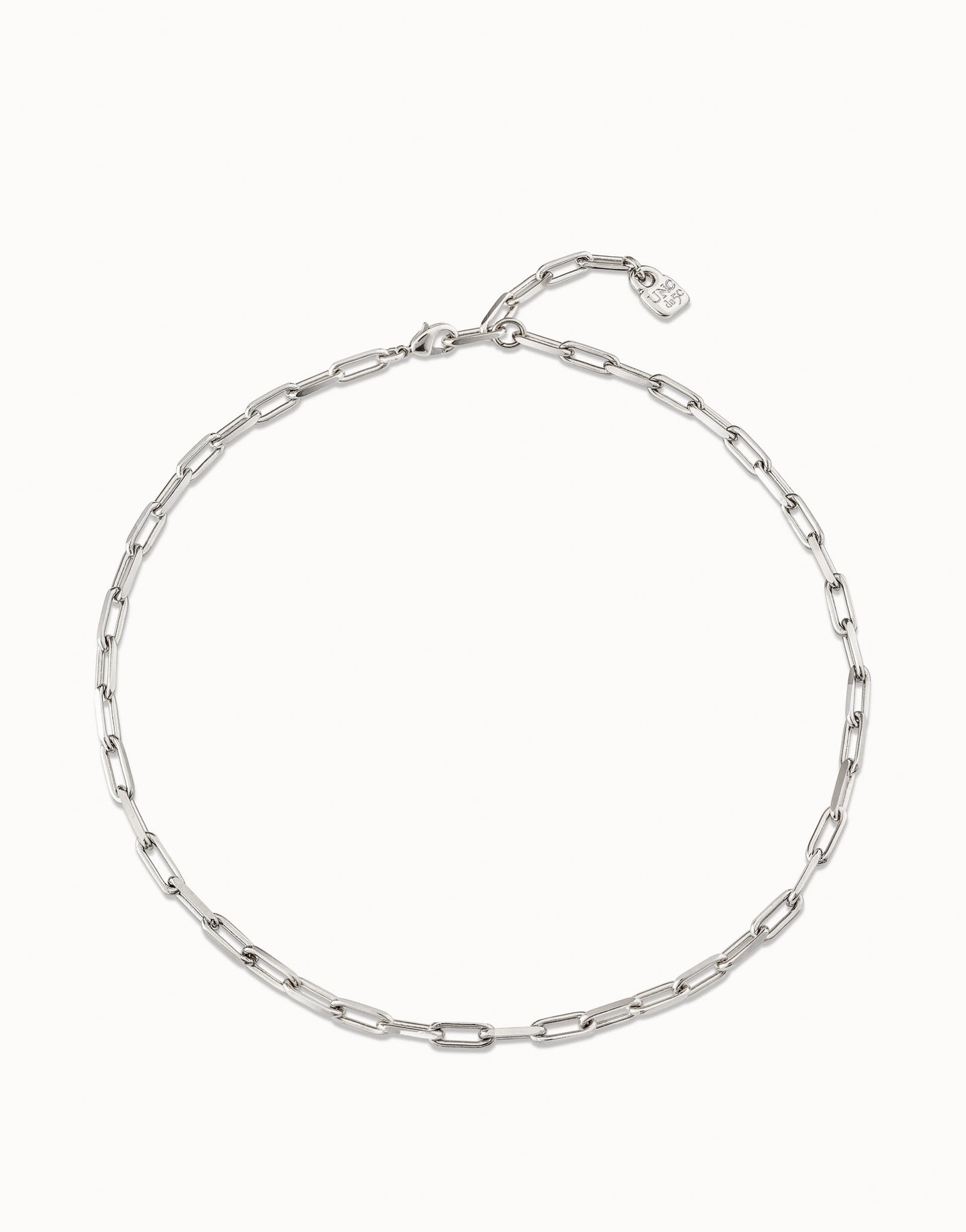 Handcrafted sterling silver chain with elongated oval links and a small tag near the clasp. Available in 16", 18", and 20" lengths.