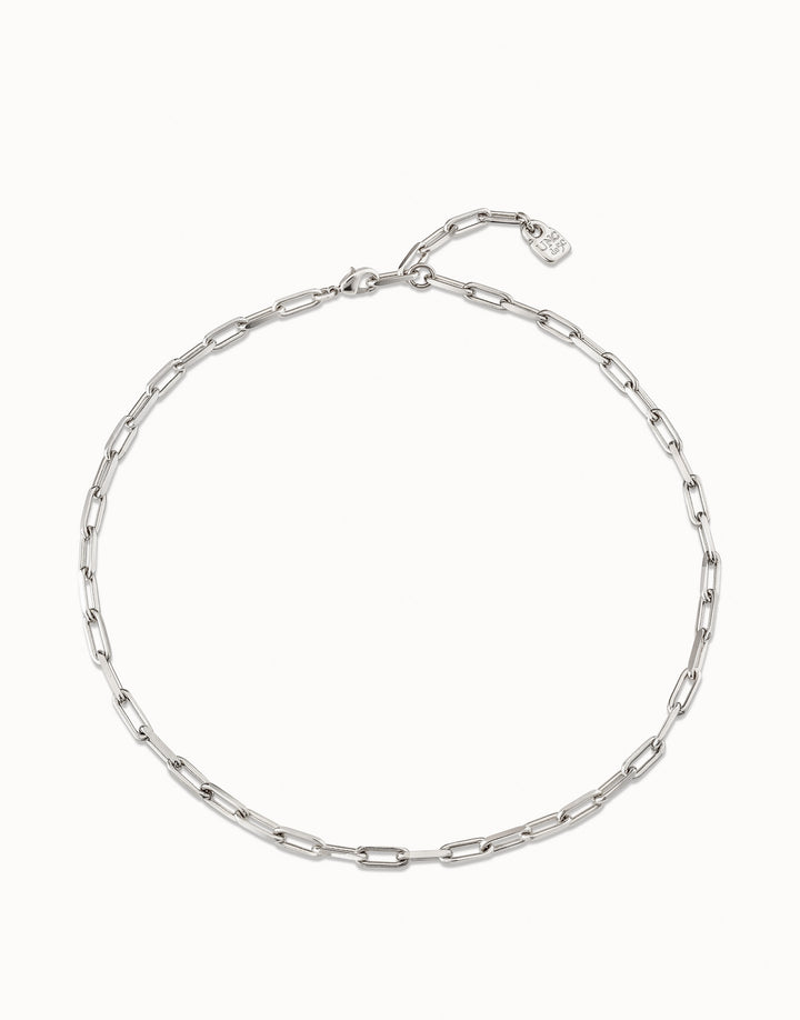 Handcrafted sterling silver chain with elongated oval links and a small tag near the clasp. Available in 16", 18", and 20" lengths.