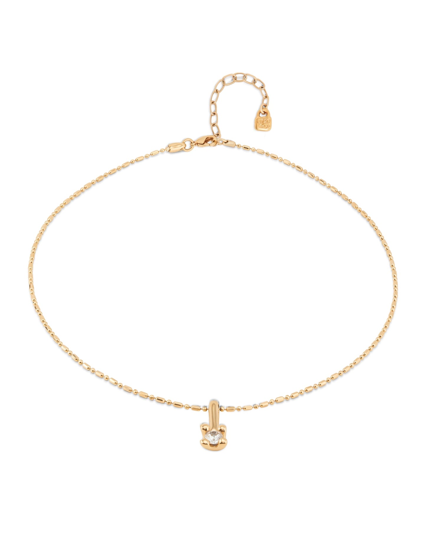 Short gold chain necklace with a white cubic zirconia pendant, adjustable clasp, extension chain, and small tag at the end. Available in 16", 18", and 20" lengths.