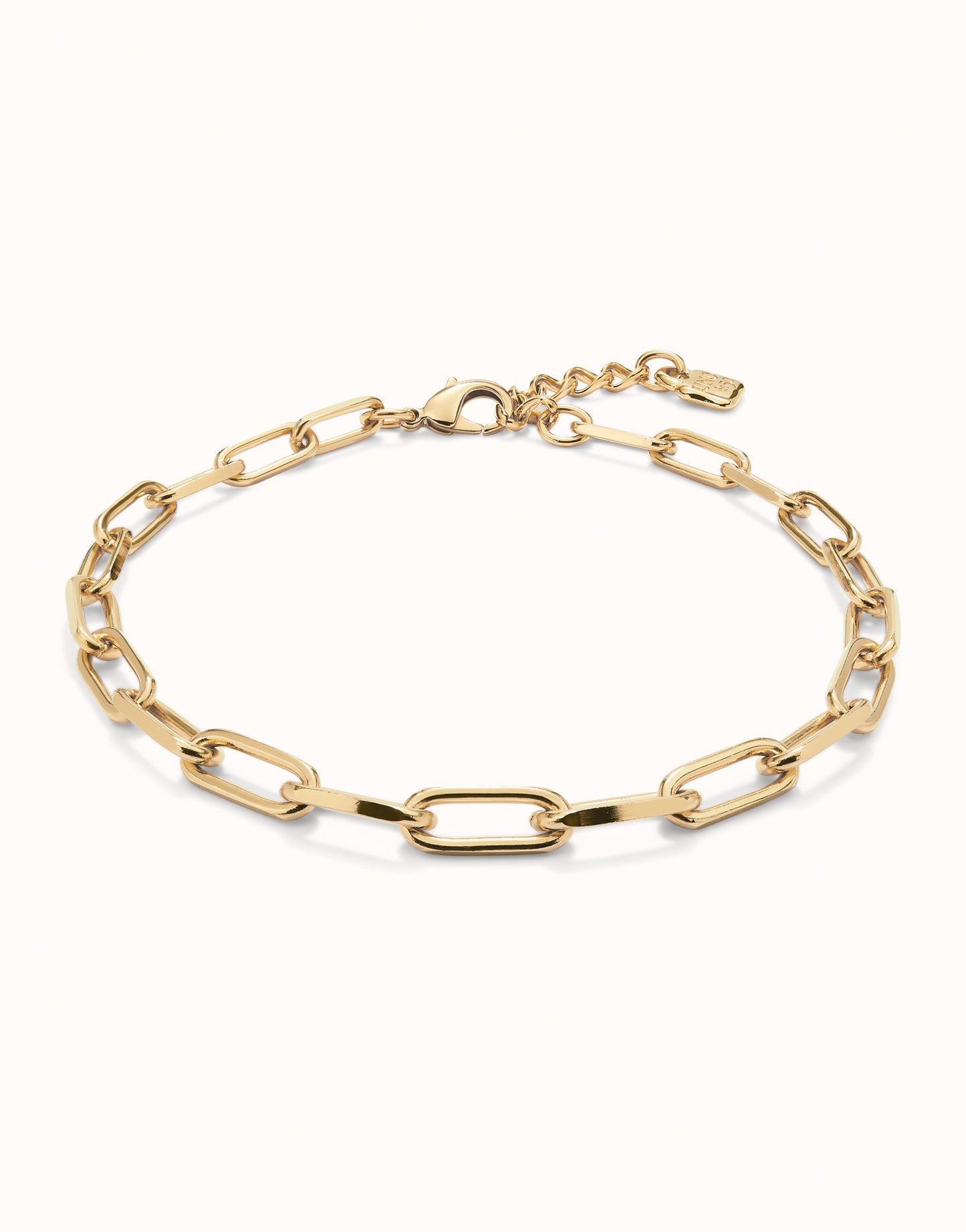 Gold Short Oval Link Chain Necklace with elegant oval links, small adjustable clasp, and tag. 18k gold-plated finish. Available in lengths 16", 18", and 20".