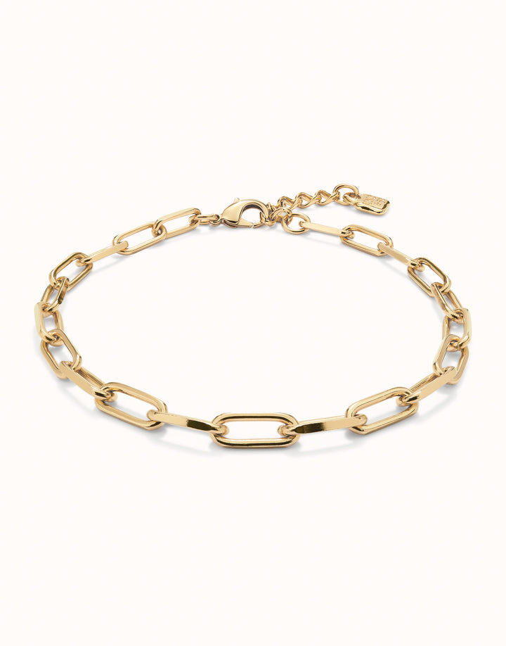 Gold Short Oval Link Chain Necklace with elegant oval links, small adjustable clasp, and tag. 18k gold-plated finish. Available in lengths 16", 18", and 20".