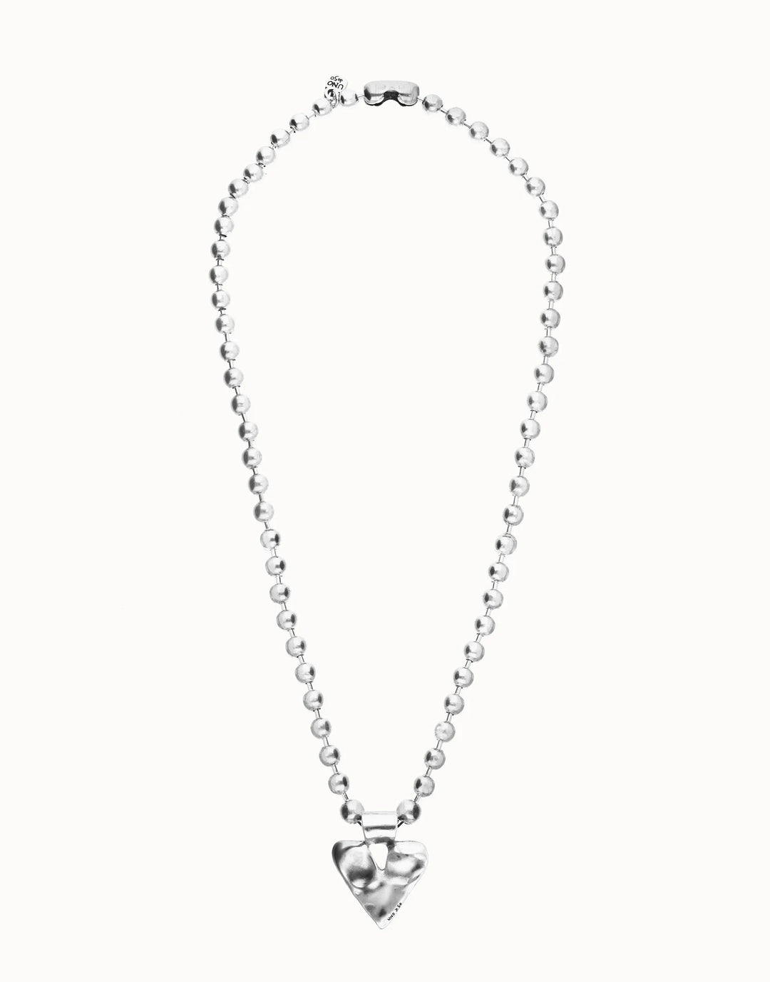 Long beaded necklace with a large, shiny heart-shaped pendant at the center; available in multiple sizes.
