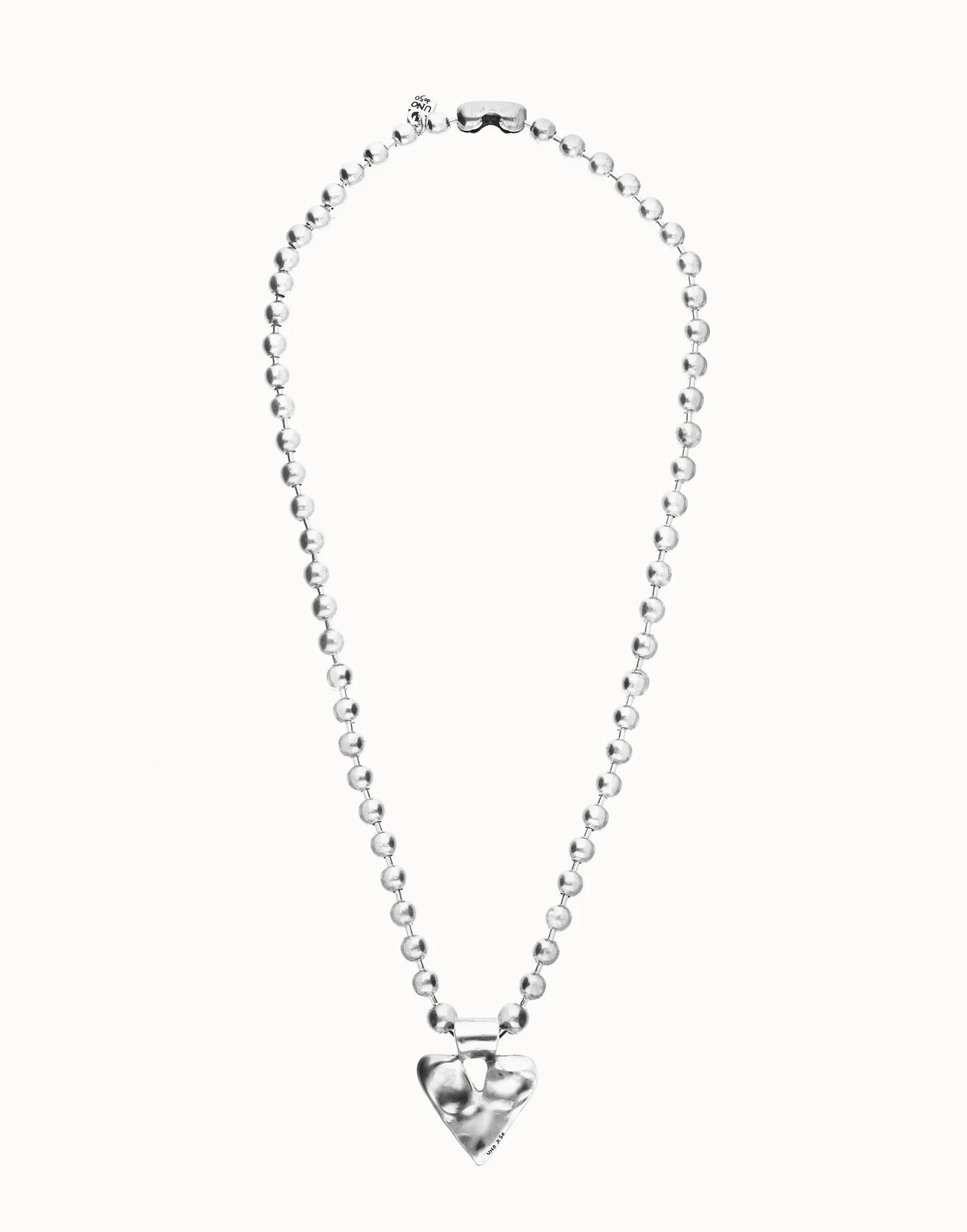 Long beaded necklace with a large, shiny heart-shaped pendant at the center; available in multiple sizes.